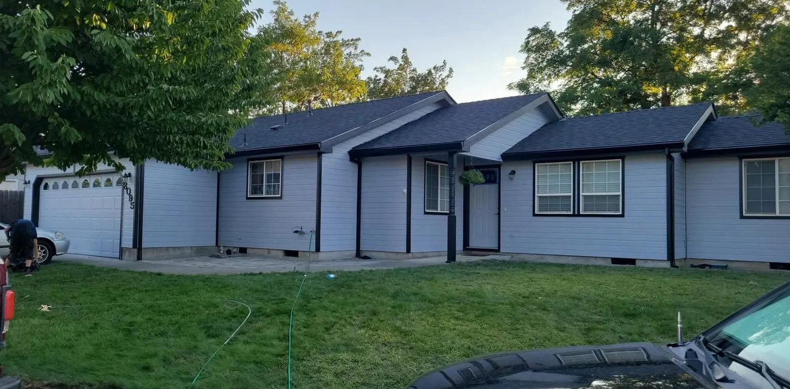 Single-story ranch home with light gray siding and an attached garage in the Eagle Point, Oregon area served by Next Gen Contracting